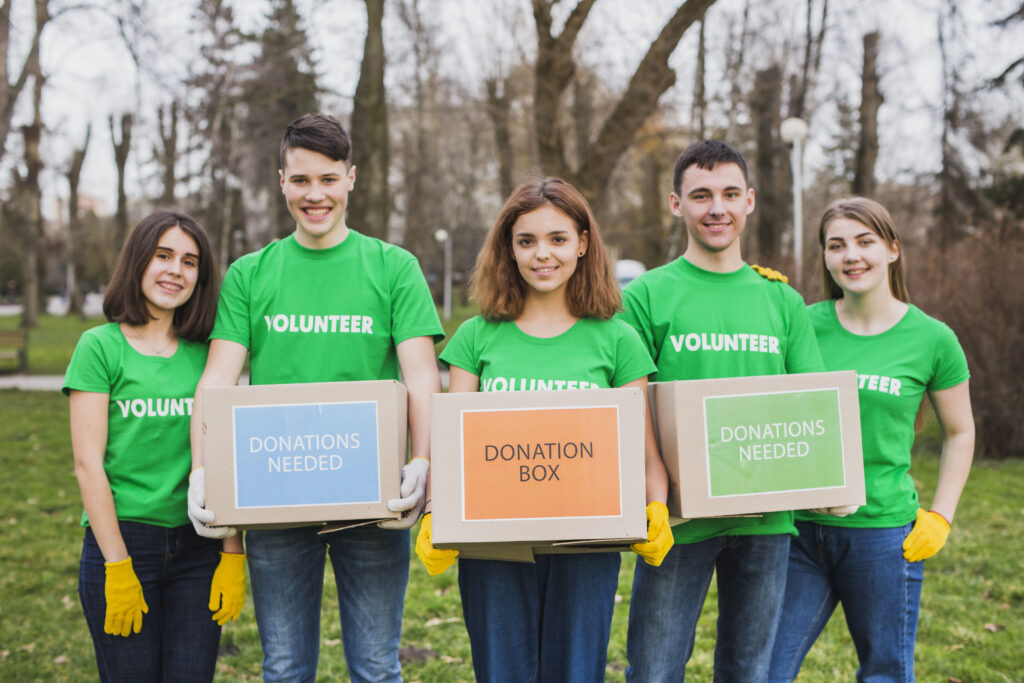 environment volunteer concept with persons holding boxes donations environment volunteer concept with persons holding boxes donations